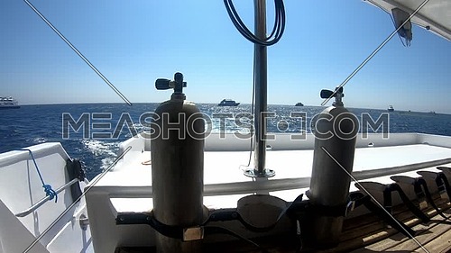 Long shot for Red Sea from yacht showing scuba tools and yachts at day.