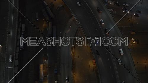 Ariel shot fly over Cairo City at Tahrir Area showing traffic, 6th of October Bridge at night - Novermber 2018