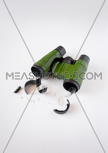 Broken green binoculars