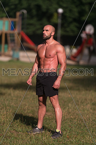 Portrait Of A Physically Fit Young Man Posing Outdoors