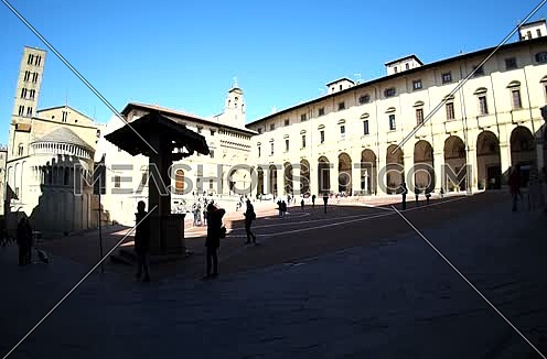 people walking on the Piazza Grande in Arezzo