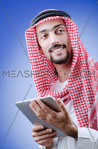 Young arab with tablet computer