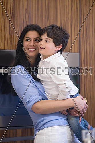 middle east mother and son spend quality time in the kitchen and enjoy it