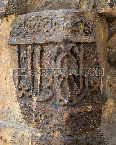Remains of an old stone exterior wall with engraved calligraphy, adjacent to the Mausoleum of al-Salih Nagm Ad-Din Ayyub, Al Moez Street, Cairo, Egypt
