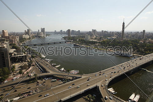 Panoramic shot of Cairo by the river nile showing the Cairo tower and the 6th of october bridge