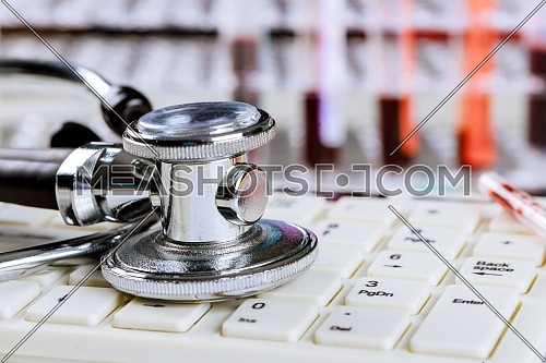 Modern medical information technology medical equipment stethoscope, keyboard computer