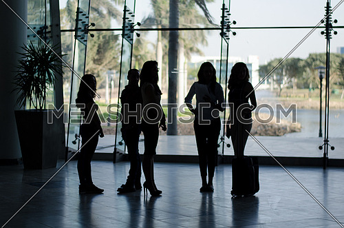 Group of ladies standing in a business office
