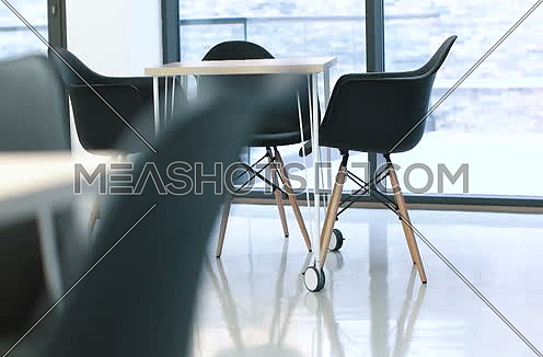 chairs and table in modern startup office