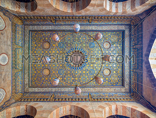 Ornate ceiling with blue and golden floral pattern decorations at Sultan Barquq mosque, Al Moez Street, Cairo, Egypt