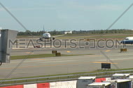 Plane sits on tarmac (2 of 2)