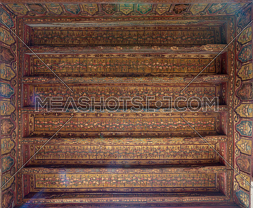 Ottoman era decorated wooden ceiling with golden floral pattern decorations at historic House of Egyptian Architecture, located in Darb El Labbana district, Cairo, Egypt