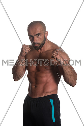 Young Muscular Sports Guy Boxing Workout Over White Background Isolated
