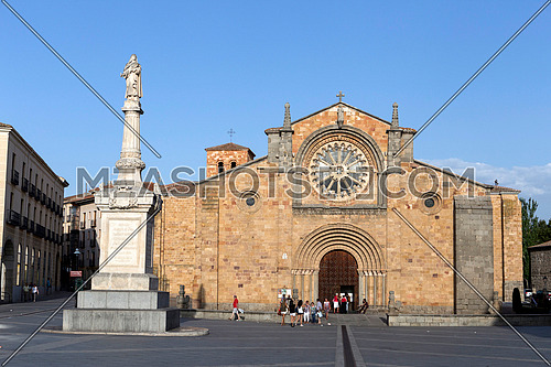 Avila, SPAIN - 10 august 2015: Santa Teresa Square, Front of the Church of San Pedro, main facade stands out its Cistercian rosette, Avila, Spain