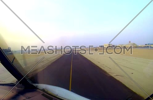Cockpit view for a Plane Taxing and moving at Egypt Cairo International Airport