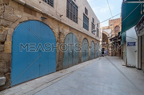 Alley at old historic Mamluk era Khan al-Khalili famous bazaar and souq, with closed shops during Covid-19 lockdown, Cairo, Egypt