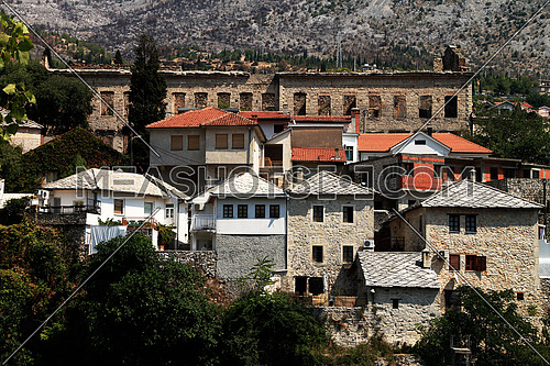 Stone buildings near famous Old bridge in Mostar , Bosnia and Herzegovina