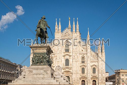 Milan cathedral (Duomo di Milano) and Vittorio Emanuele statue at sunny day,Milan,Italy.