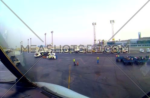 Cockpit view for a Plane Taxing and Parking at Egypt Cairo International Airport