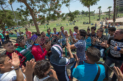 egyptian Youth group sings in the park to celebrate Eid al-Fitr