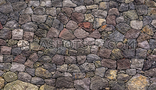 Background texture of stone wall. Natural stone, a wall of natural stone.