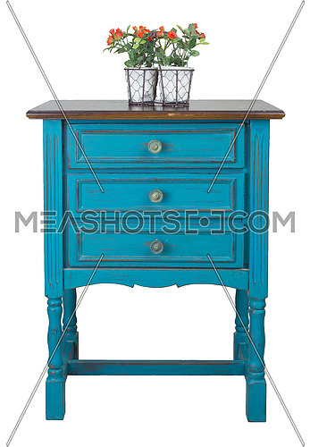 Vintage Furniture - Vintage turquoise commode (Chest of Drawers) with 3 drawers with brass fittings and flower planter isolated on white background including clipping path