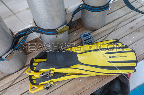 Long shot scuba tools on yacht by day.