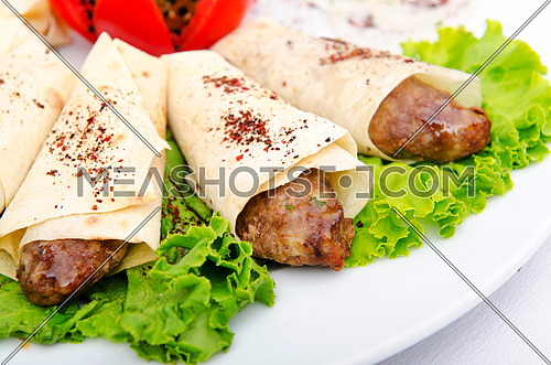 Meat kebabs wrapped in pita