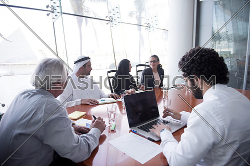 multi ethnic  business people group on meeting at modern  office