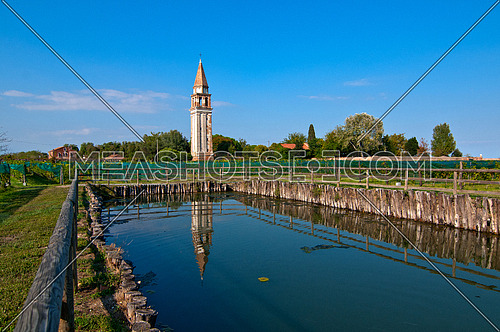 Venice Burano Mazorbo vineyard with "campanile " belltower of Saint Caterina on the background