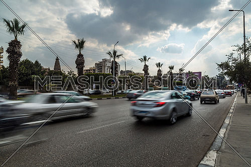 Long Shot for traffic at Salah Salim Street showing Le Baron Palace in background at Daytime