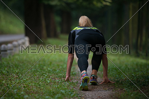 Female Athlete Runner In Starting Line Ready For Running And Sprint - Fitness Healthy Lifestyle Concept