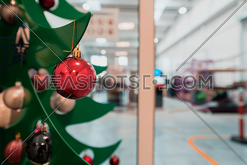 Christmas tree with a garland in the office. High quality photo