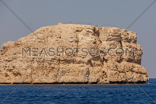 Long shot from Red Sea showing Ras Muhammed Island by day