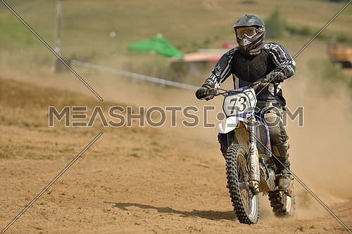 motocross bike in a race representing concept of speed and power in extreme man sport