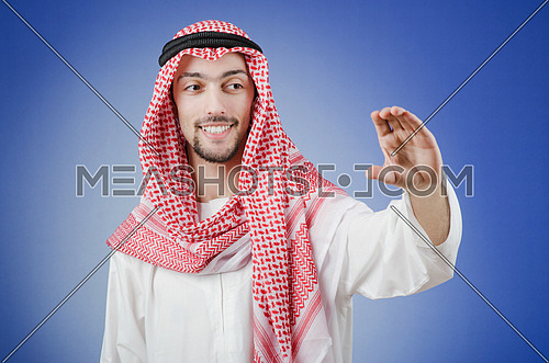 Arab pushing virtual buttons