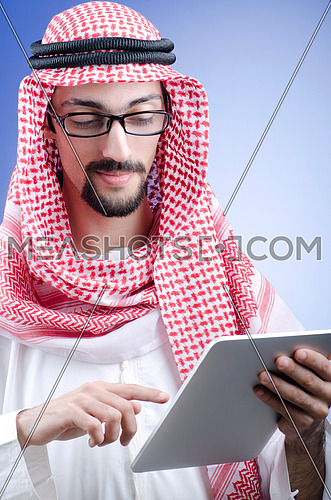 Arab businessman with tablet computer