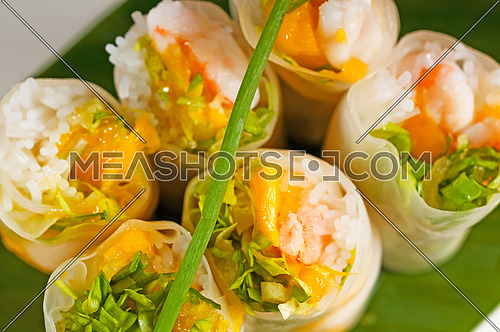 fresh tipycal vietnamese style summer rolls,on a palm leaf