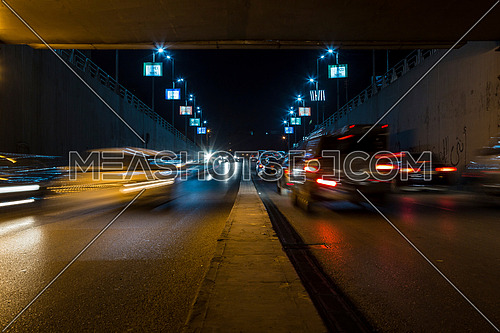 Long Shot for traffic from inside  Al Thawra Tunnel at Night