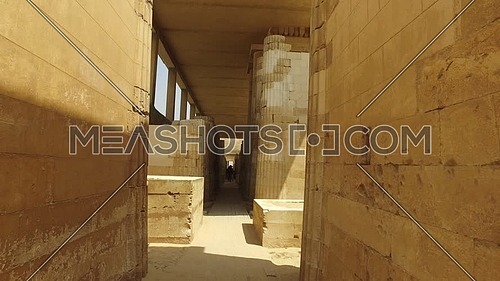 Track shot into small pharaonic temple at Saqqara Area in Giza at day.
