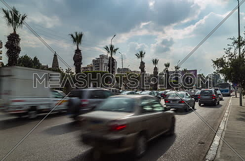 Fixed Shot for traffic at Salah Salim Street showing Le Baron Palace in background at Daytime