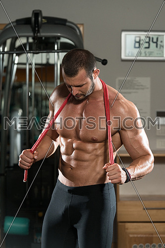 Handsome Muscular Man With Jumping Rope