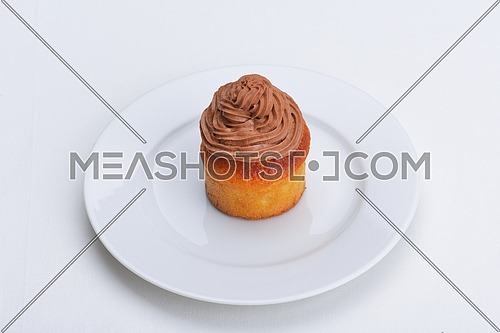 muffin with chocolate sauce dessert isolated on white background