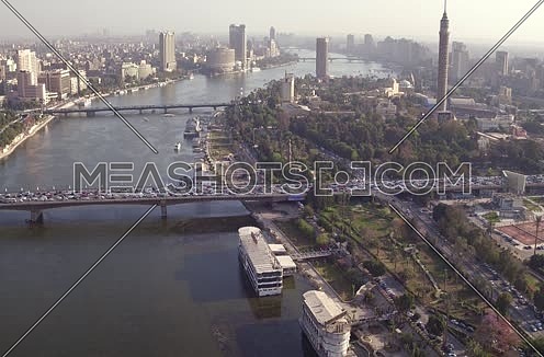 Aerial Shot for the River Nile to 6th of Octobre Bridge this Kasr Al Nile Bridge in background  at Cairo at Day