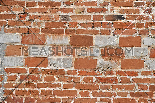 Antique wall texture of red and white bricks of different sizes