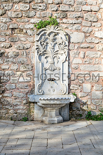 Marble sculpted drinking fountain at Gulhane Park, Sultan Ahmet district, Istanbul, Turkey