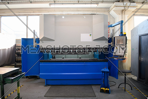 modern industrial factory for mechanical engineering equipment and machines manufacture of a production hall. High quality photo