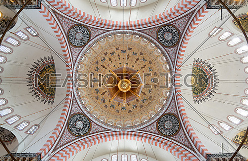 Decorated ceiling of Suleymaniye Mosque showing intersection of four domes with the main big dome, Istanbul, Turkey