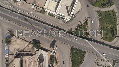 Aerial Bird-eye shot flying over Cairo Downtown empty streets during the corona pandemic lockdown by day 10 April 2020
