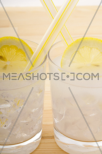 fresh lemonade drink with lemon slice closeup