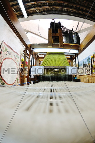 old wooden machine for produce traditional arabic rug